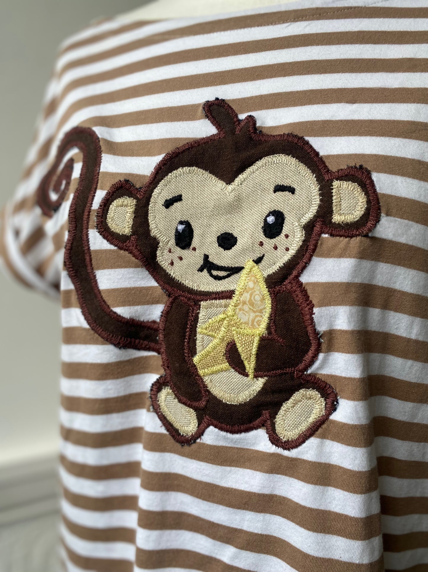 Striped T with monkey patch