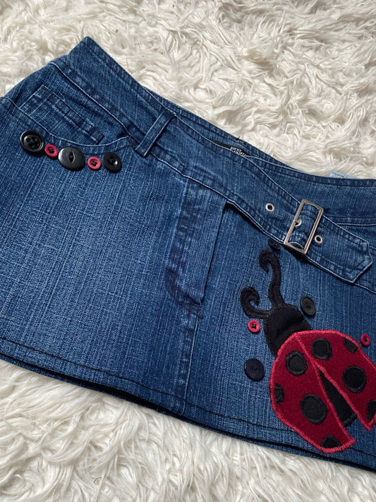 Blue denim skirt with ladybirds