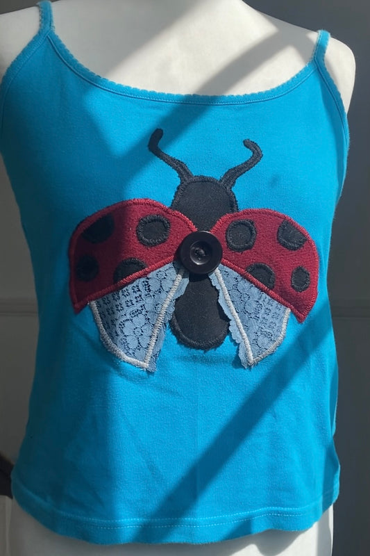light blue Cami with ladybird ￼