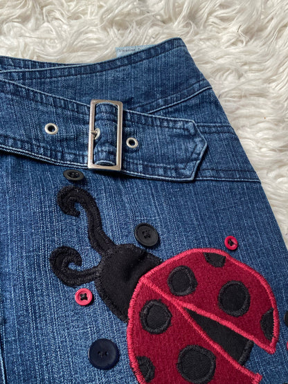 Blue denim skirt with ladybirds
