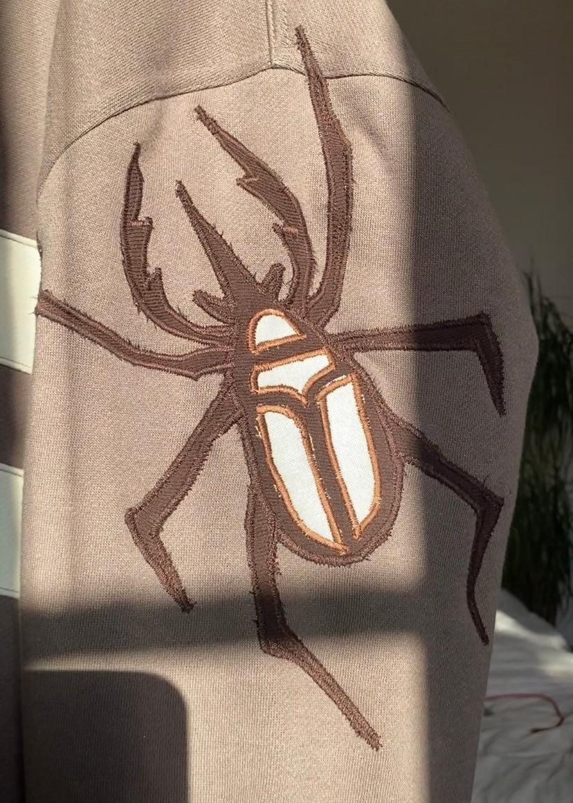 Brown bug jumper