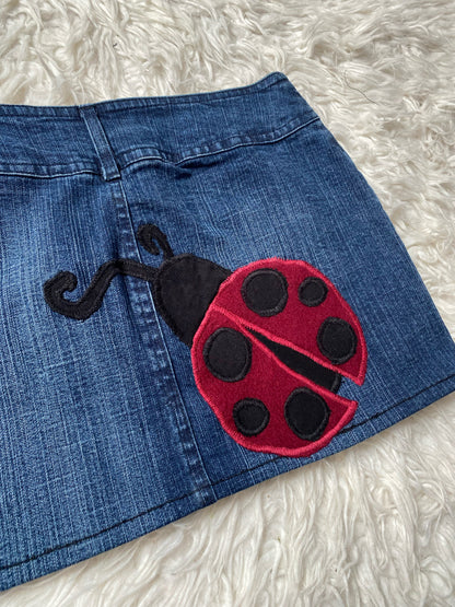 Blue denim skirt with ladybirds