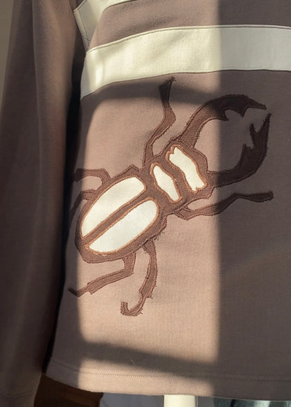Brown bug jumper
