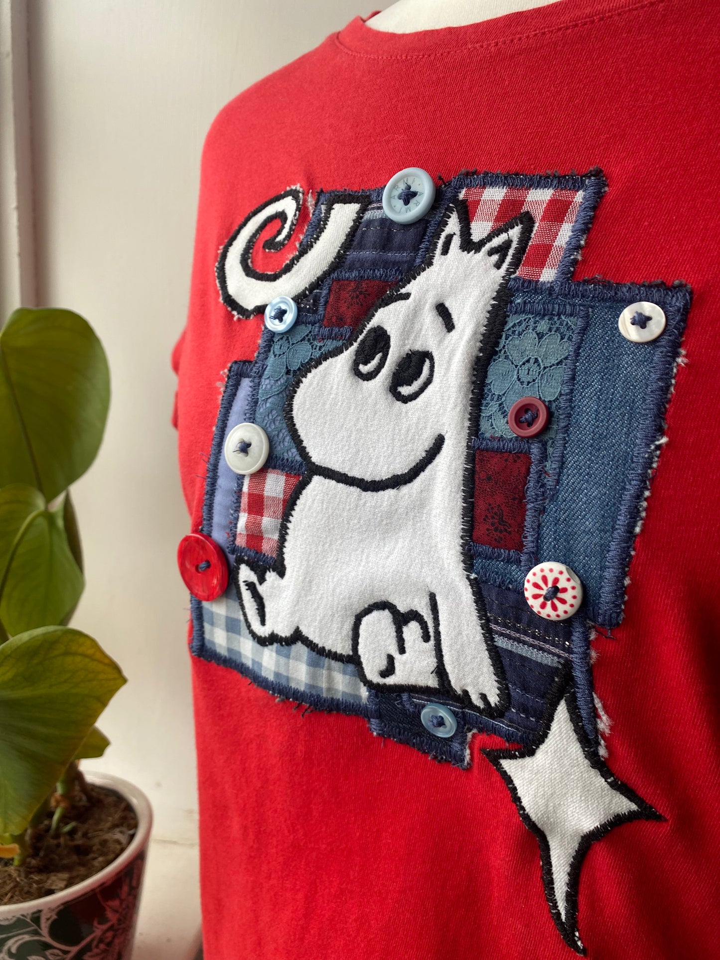 Red tea with white hippo patch